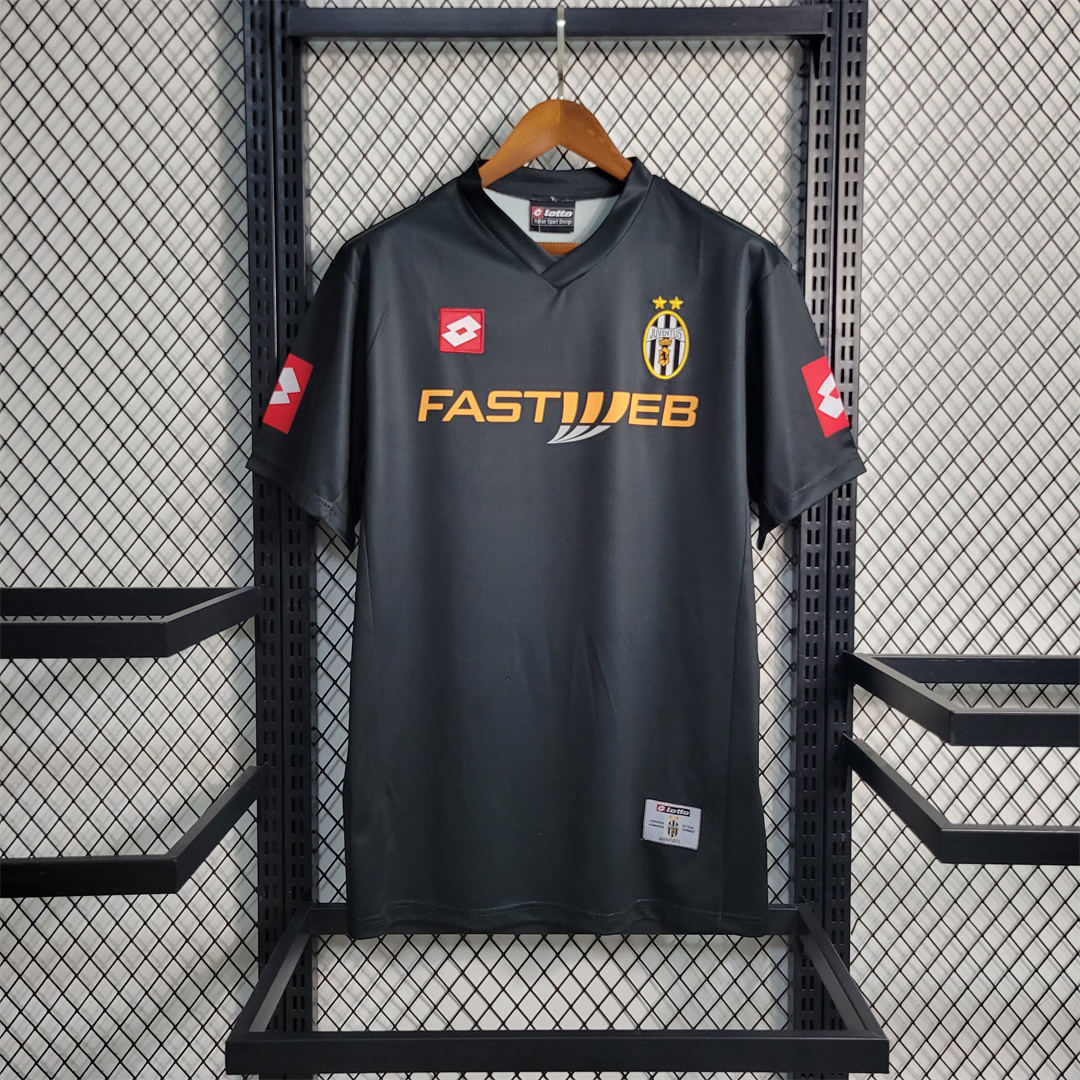 Mens Juventus Retro Away Jersey 2001/02 Mens Juventus Retro Away Jersey 2001/02 on hanger showing black and red panels with FASTWEB sponsor