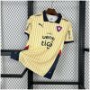 Mens Cerro Porteno Away Jersey 2025/26 on display showing cream body with navy and red pinstripes and dark polo collar