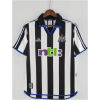 Mens Newcastle United Retro Home Jersey 2000/01 on hanger showing black and white stripes with blue trim and ntl: