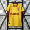 Mens Lens Home Jersey 2025/26 on hanger displaying yellow body with red vertical pinstripes and anniversary crest