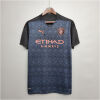 Mens Manchester City Retro Away Jersey 2020/21 on hanger showing dark navy Castlefield mosaic pattern with rose gold crest