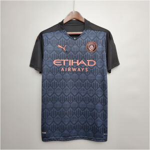 Mens Manchester City Retro Away Jersey 2020/21 on hanger showing dark navy Castlefield mosaic pattern with rose gold crest