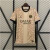 Mens PSG Fourth Jersey 2023/24 on hanger showing sand elephant print body with olive logos and navy collar