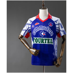 Mens PSG Retro Away Jersey 1992/93 on hanger showing royal blue body with spray pattern sleeves and Commodore branding