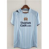 Mens Manchester City Retro Home Jersey 2008/09 on hanger showing sky blue body with white pinstripes and navy sponsor