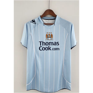 Mens Manchester City Retro Home Jersey 2008/09 on hanger showing sky blue body with white pinstripes and navy sponsor