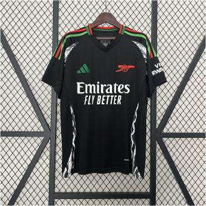 Mens Arsenal Away Jersey 2024/25 on display showing black body with Pan-African red and green accents and geometric side panels