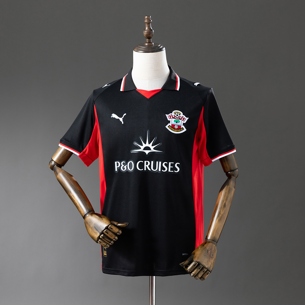 Mens Southampton Third Jersey 2025/26 Mens Southampton Third Jersey 2025/26 on mannequin showing black body with red side panels and P&O CRUISES