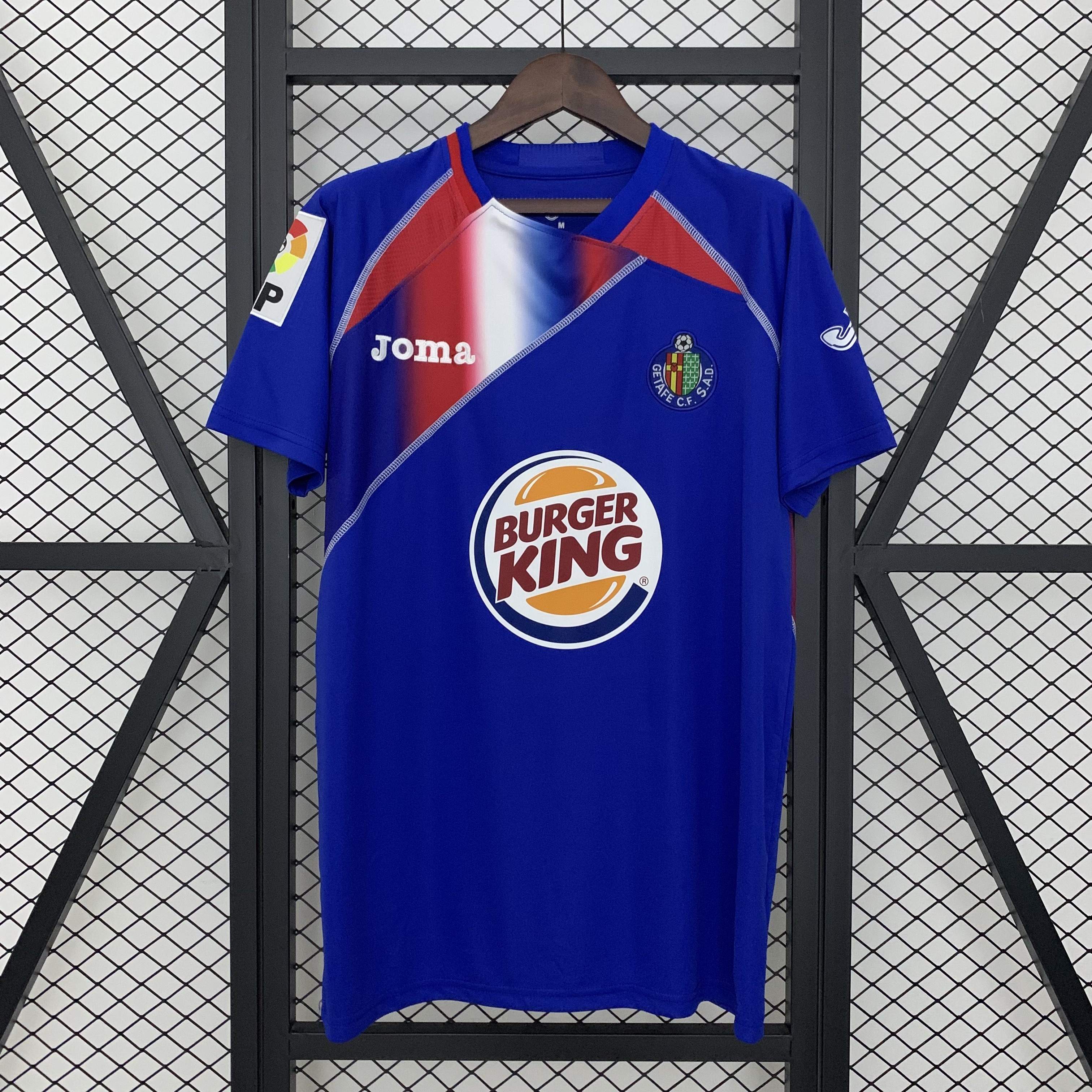 Mens Getafe Retro Home Jersey 2009/10 Mens Getafe Retro Home Jersey 2009/10 front view on display