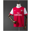 Mens Arsenal Retro Home Jersey 2010/11 on hanger showing red body with white raglan sleeves and Fly Emirates sponsor