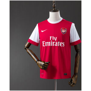 Mens Arsenal Retro Home Jersey 2010/11 on hanger showing red body with white raglan sleeves and Fly Emirates sponsor