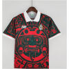 Mens Mexico Retro Fourth Jersey 1997 on mannequin showing forest green base and red Aztec Sun Stone