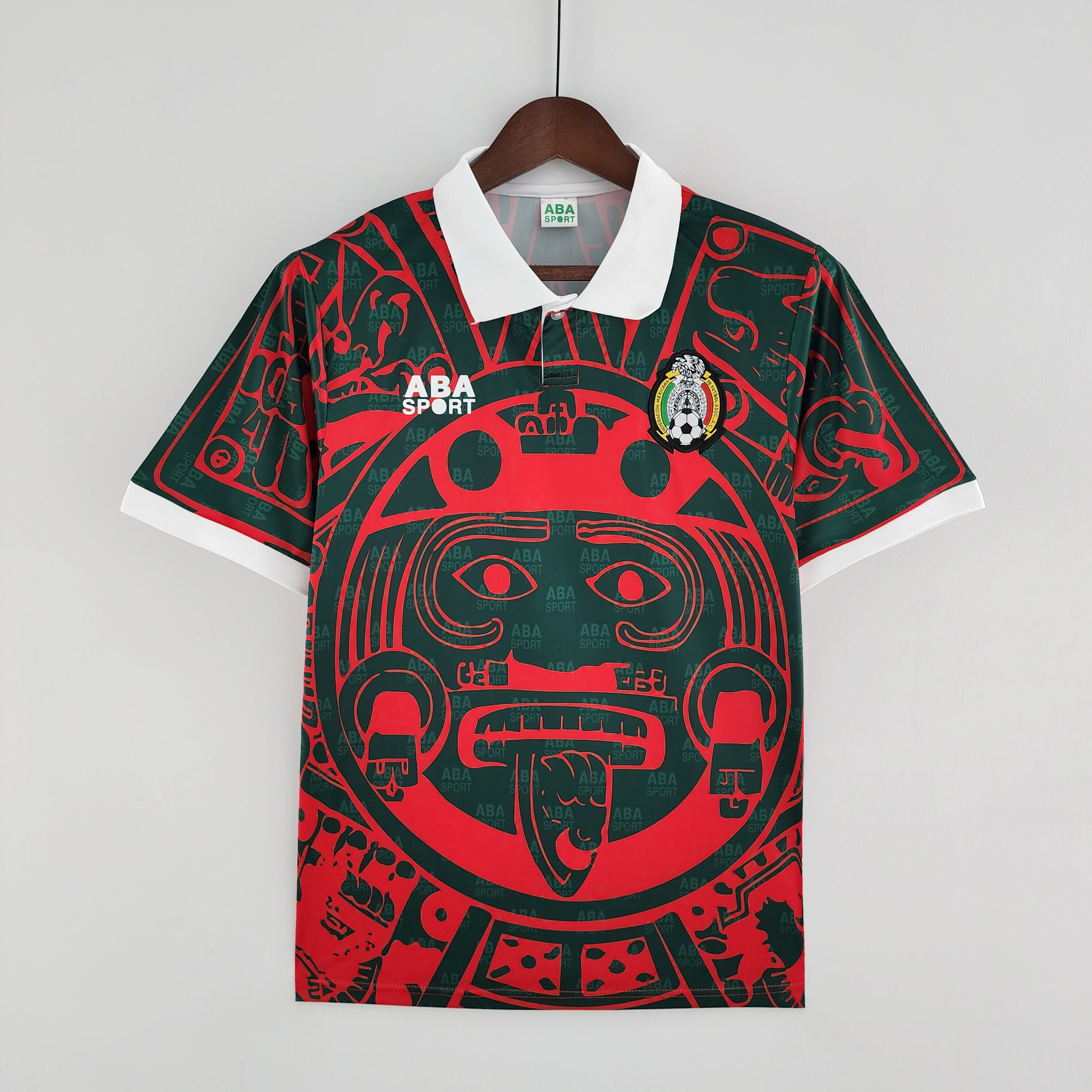 Mens Mexico Retro Fourth Jersey 1997 Mens Mexico Retro Fourth Jersey 1997 on mannequin showing forest green base and red Aztec Sun Stone