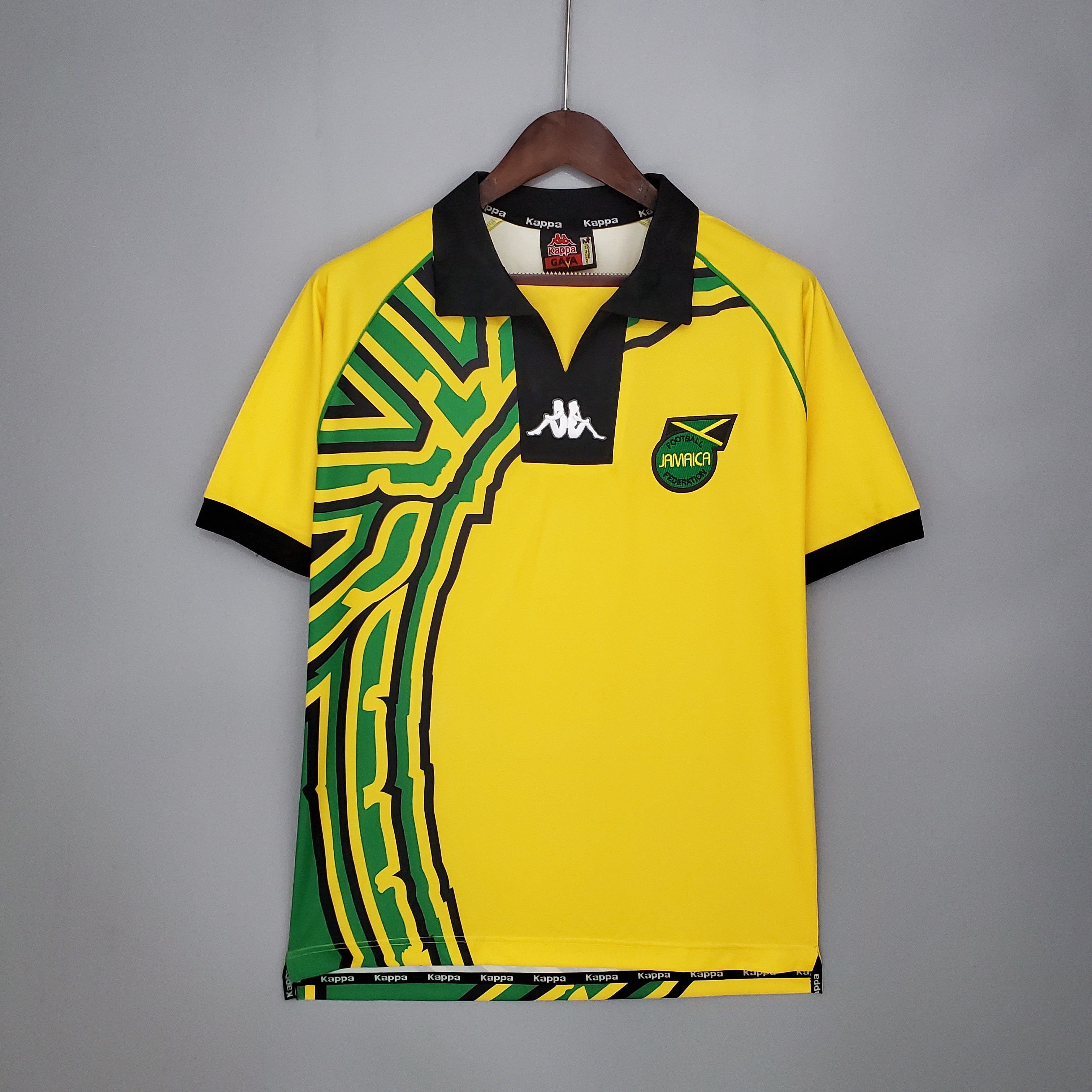 Mens World Cup Jamaica Retro Home Jersey 1998 Mens World Cup Jamaica Retro Home Jersey 1998 on mannequin showing yellow base and tribal wing panel