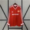 Mens Manchester United Retro Long Sleeve Home Jersey 1986/88 on mannequin showing red body with diagonal shadow stripes