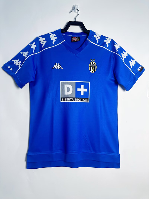 Mens Juventus Retro Away Jersey 1999/00 Mens Juventus Retro Away Jersey 1999/00 on hanger showing royal blue body and taped shoulders