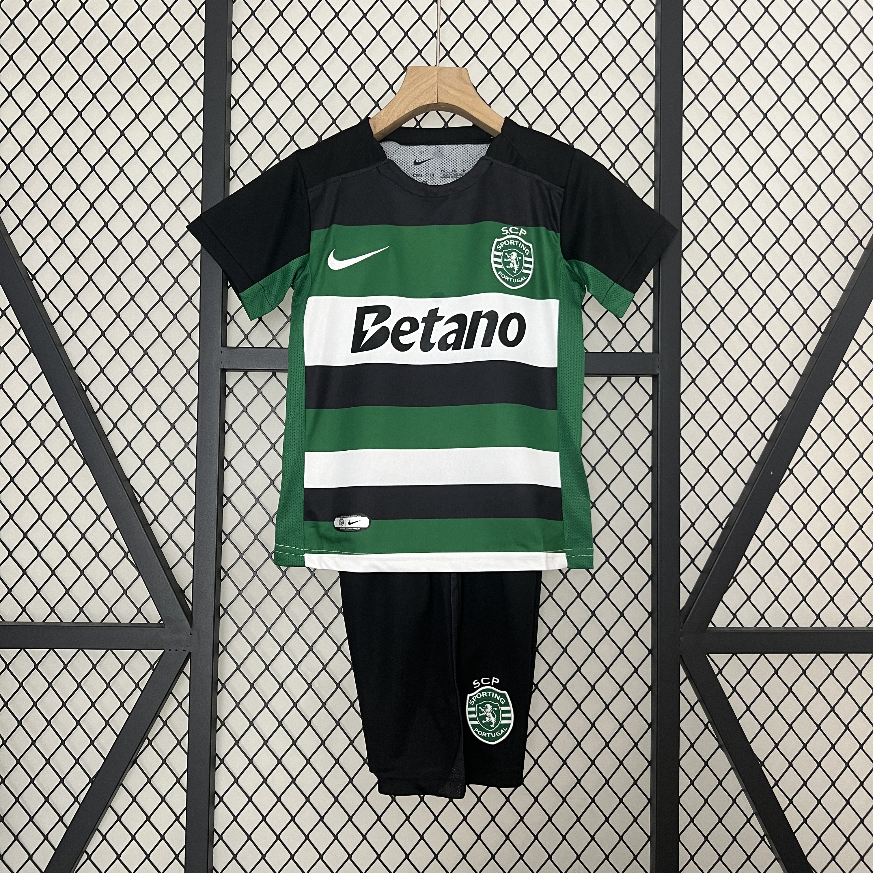Kids Sporting Lisbon Home Kit 2024/25 Kids Sporting Lisbon Home Kit 2024/25 showing jersey and matching black shorts