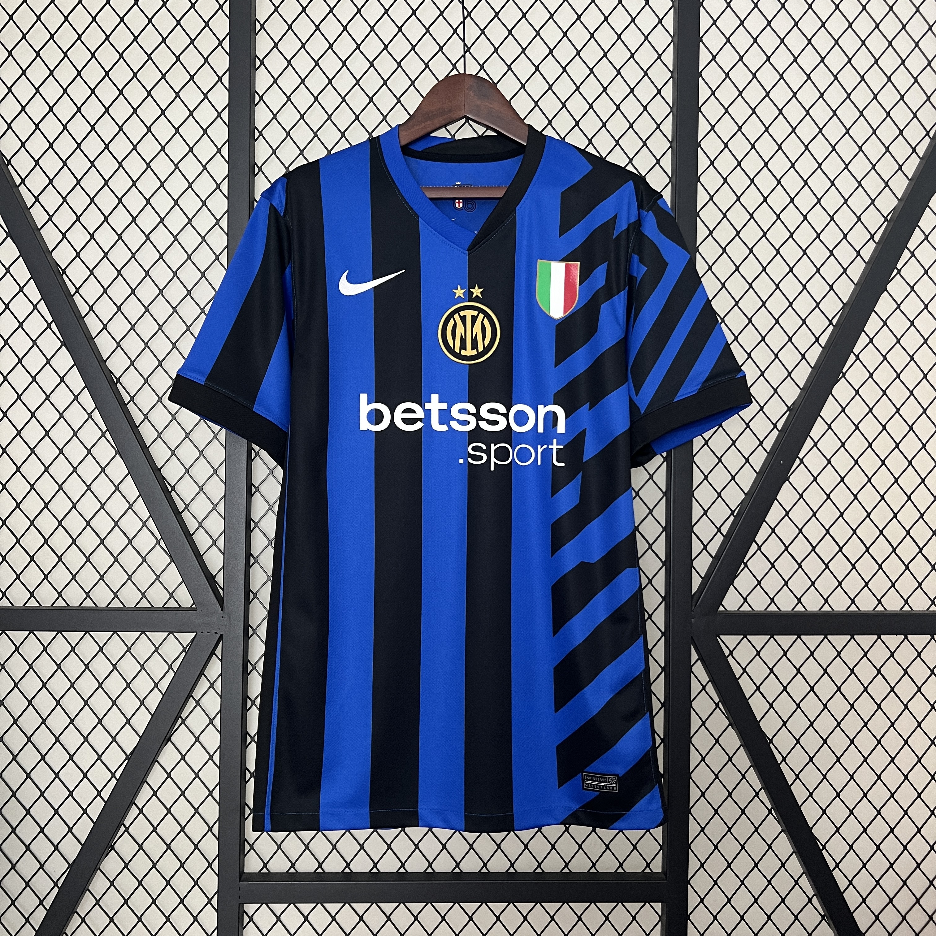 Mens Inter Milan Home Jersey 2024/25 Mens Inter Milan Home Jersey 2024/25 on hanger showing blue-black stripes with two gold stars and Scudetto