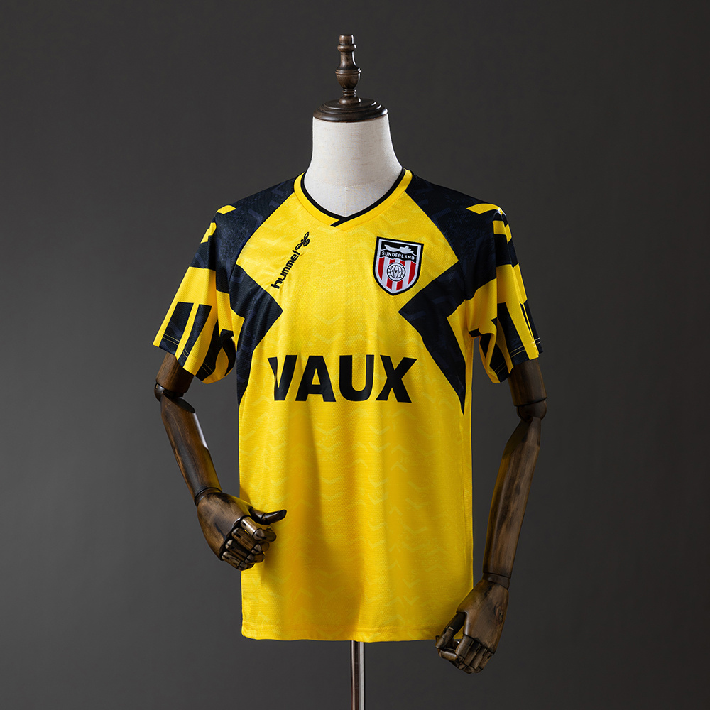 Mens Sunderland Second Retro Away Jersey 1992/93 Mens Sunderland Second Retro Away Jersey 1992/93 on mannequin showing yellow body with navy chevrons and VAUX