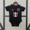 Baby Miami Away Suit 2024/25 black infant bodysuit showing pink crest and sponsor