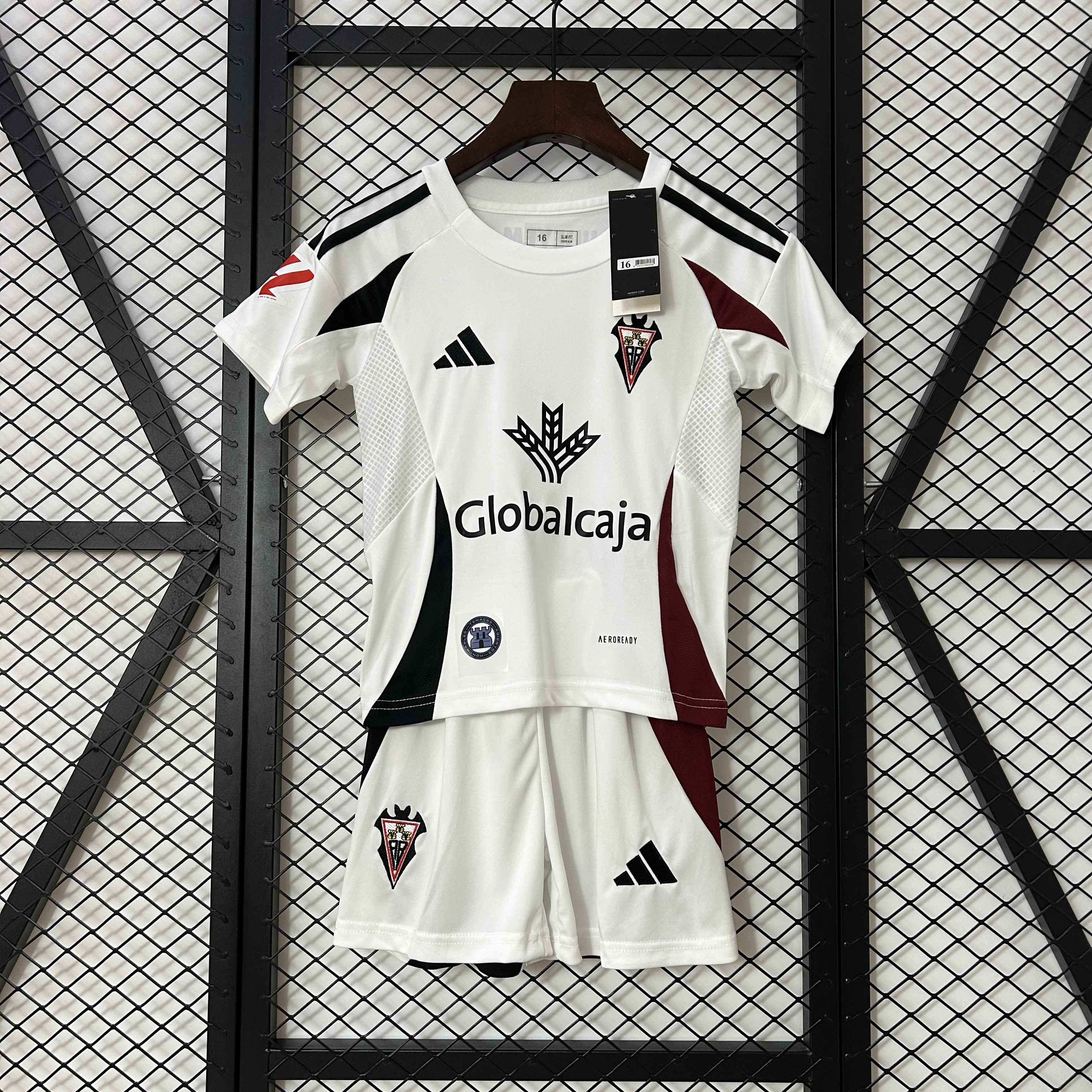 Kids Albacete BP Home Kit 2024/25 Kids Albacete BP Home Kit 2024/25 front view on display