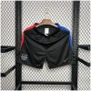 Black Barcelona away shorts with red and blue side panels front view