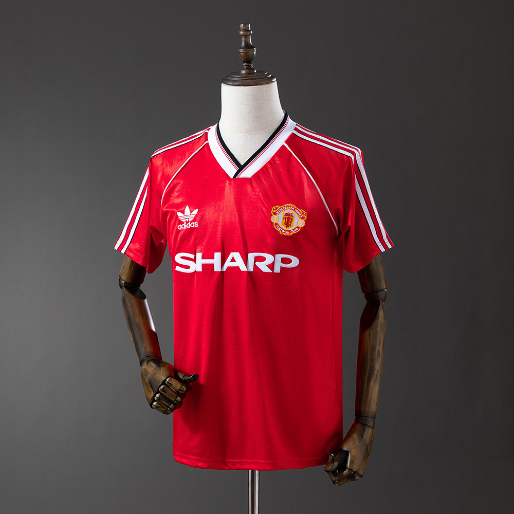Mens Manchester United Retro Home Jersey 1984/85 Mens Manchester United Retro Home Jersey 1984/85 on mannequin showing red pinstripe body with white piping