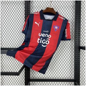Mens Cerro Porteno Home Jersey 2025/26 on display showing navy and red vertical stripes with ueno and tigo sponsors