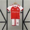 Kids Internacional Home Kit 2024/25 front view on display