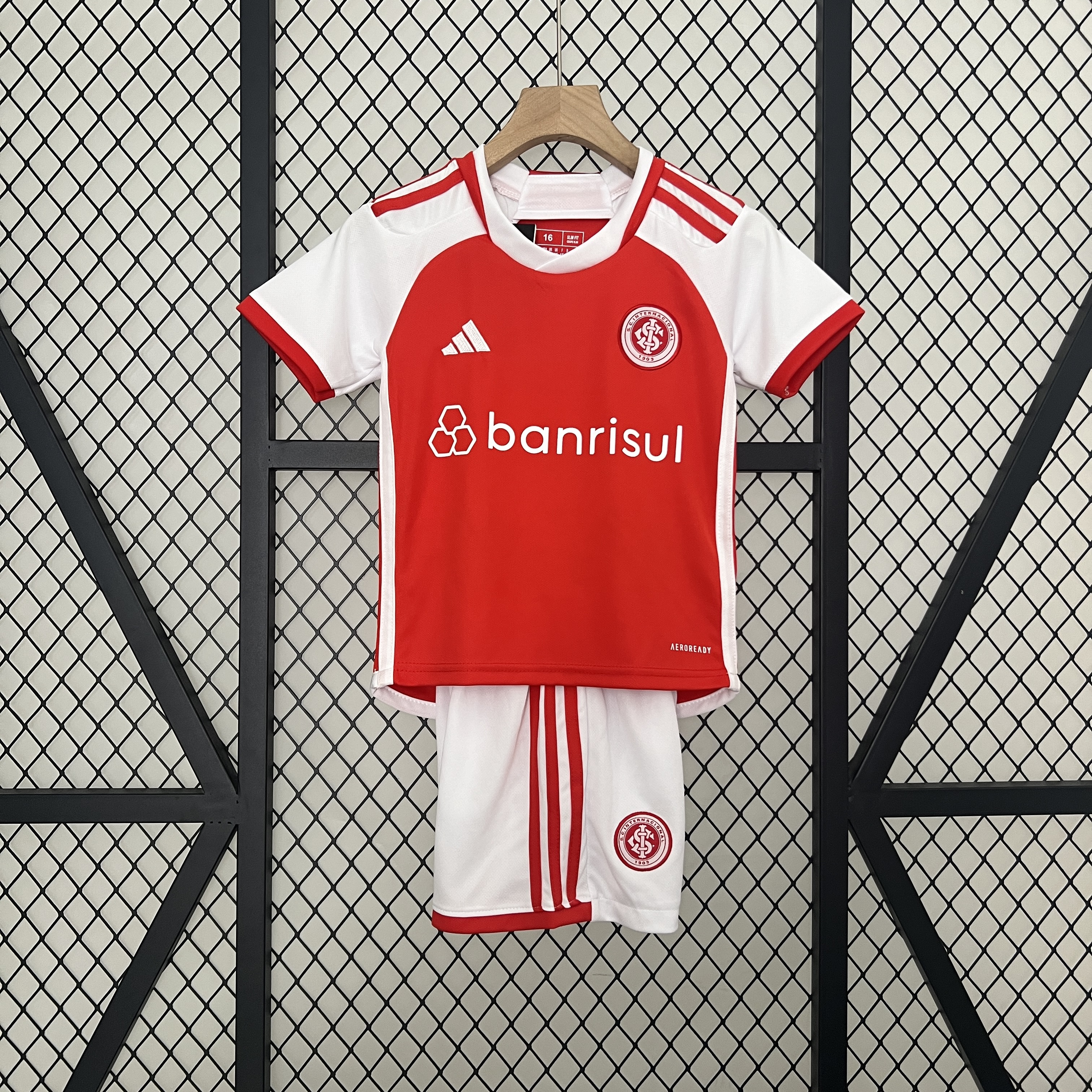 Kids Internacional Home Kit 2024/25 Kids Internacional Home Kit 2024/25 front view on display
