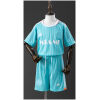 Kids Inter Miami Third Kit 2024/25 turquoise jersey and shorts set showing retro graphics