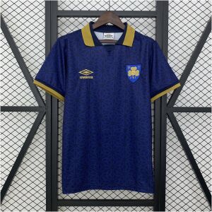 Mens Ireland St. Patrick Day Away Jersey 2025/26 front view on hanger featuring navy Celtic pattern and gold collar