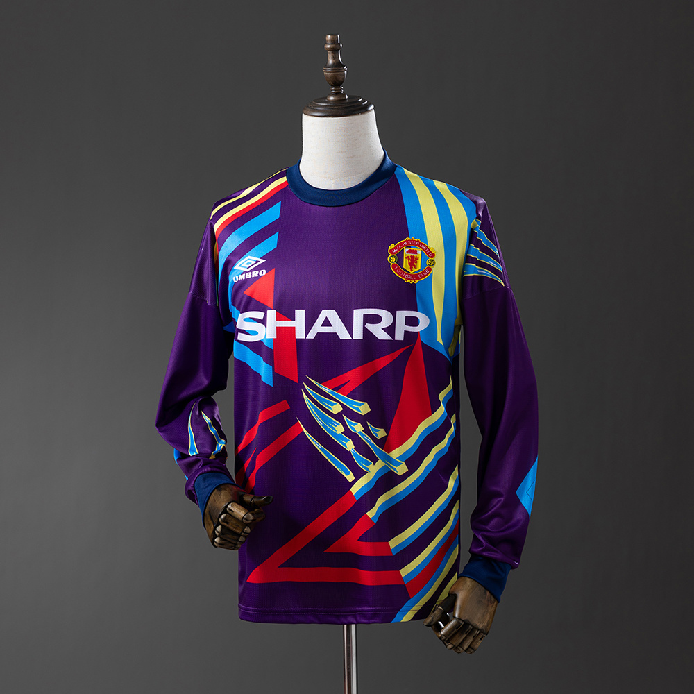Mens Manchester United Retro Long Sleeve Goalkeeper Jersey 1992/94 Mens Manchester United Retro Long Sleeve Goalkeeper Jersey 1992/94 on mannequin showing purple geometric patterns