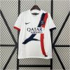Mens PSG Away Jersey 2024/25 on hanger displaying white body and red-blue brushstroke Eiffel Tower motif