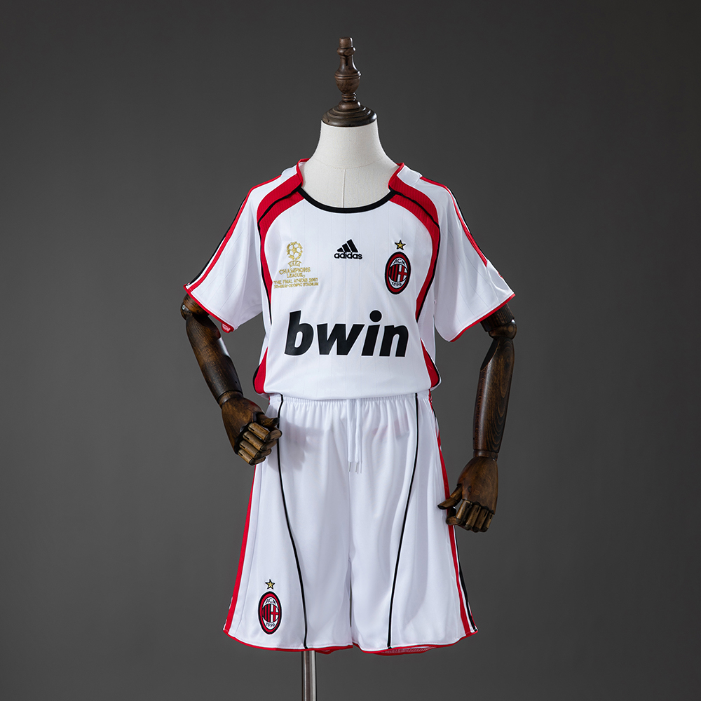 Kids AC Milan Retro Away Kit 2006/07 Kids AC Milan Retro Away Kit 2006/07 front view in white with Athens 2007 embroidery and shorts