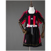 Kids AC Milan Retro Home Kit 2006/07 front view showing red and black striped jersey with matching shorts