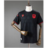 Front display of Mens Albania Third Jersey 2026 in black with tonal rosette pattern and red FSHF badge