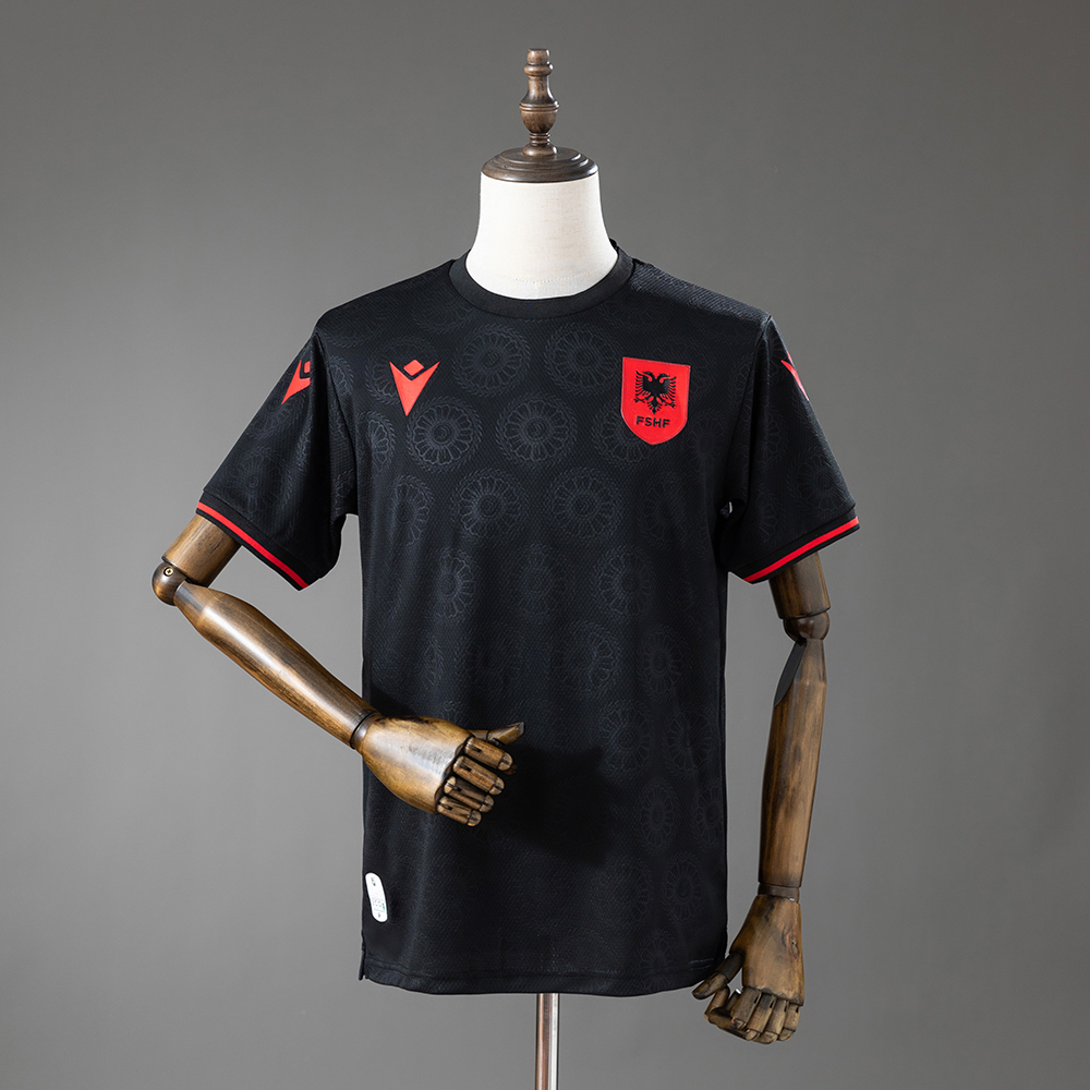 Mens Albania Third Jersey 2026 Front display of Mens Albania Third Jersey 2026 in black with tonal rosette pattern and red FSHF badge