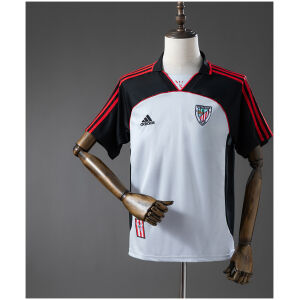 Front view of the Mens Athletic Retro Third Jersey 2002/03 in black and white with red piping