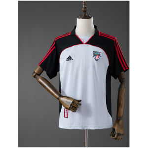 Front view of the Mens Athletic Bilbao Retro Third Jersey 1999/00 in white and black with red shoulder stripes and club crest