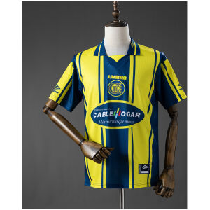 Front view of the Mens Atletico Rosario Central Retro Home Jersey 1998/99 in yellow and blue with Cablehogar sponsor