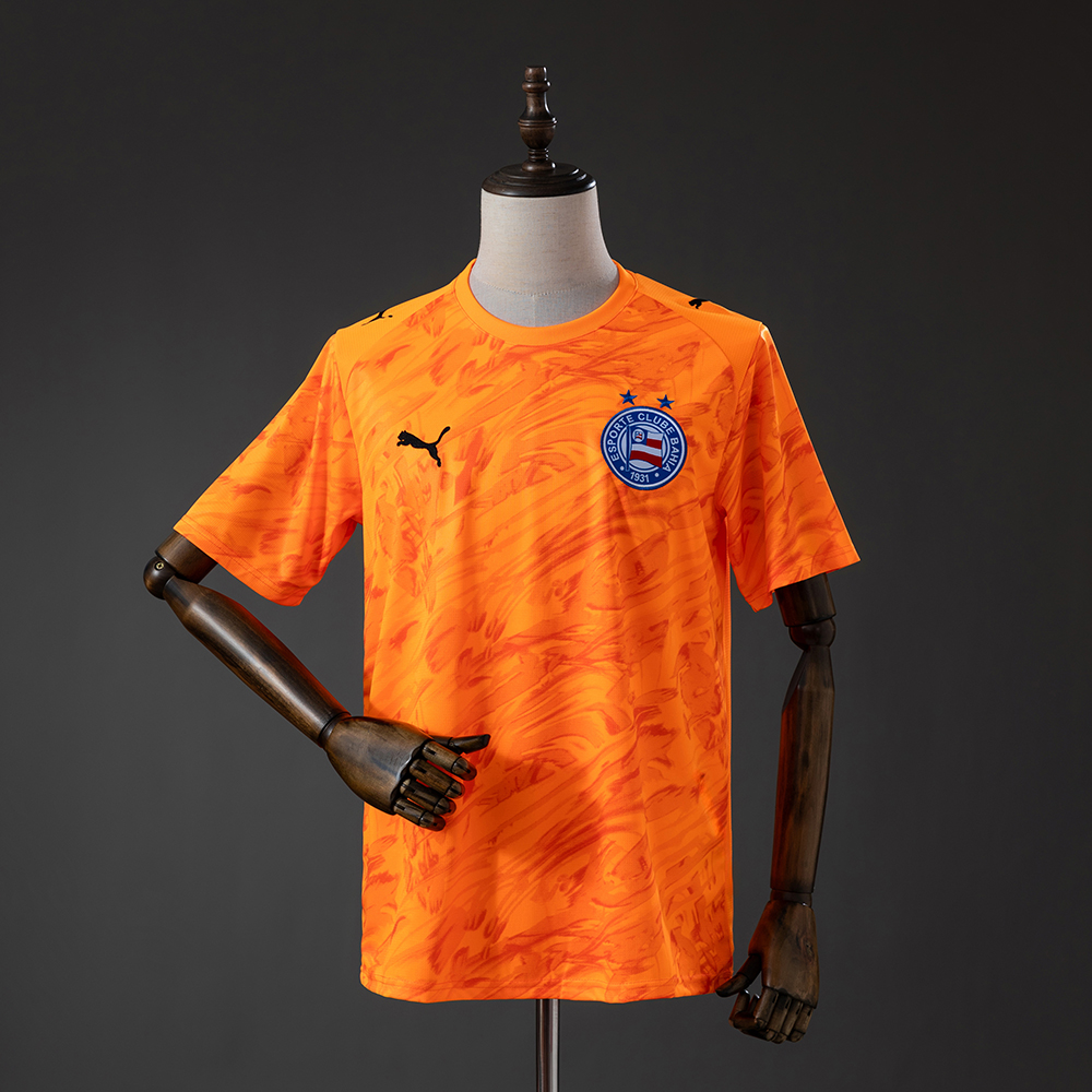 Mens Bahia GK-Orange Jersey 2026/27 Mens Bahia GK-Orange Jersey 2026/27 front view in bright orange with dynamic brushstroke graphics