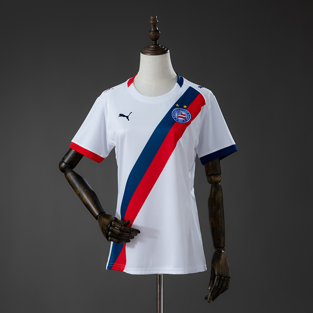 Womens Bahia 2627 Home Jersey Womens Bahia 2627 Home Jersey front view in white with diagonal blue and red sash and club crest