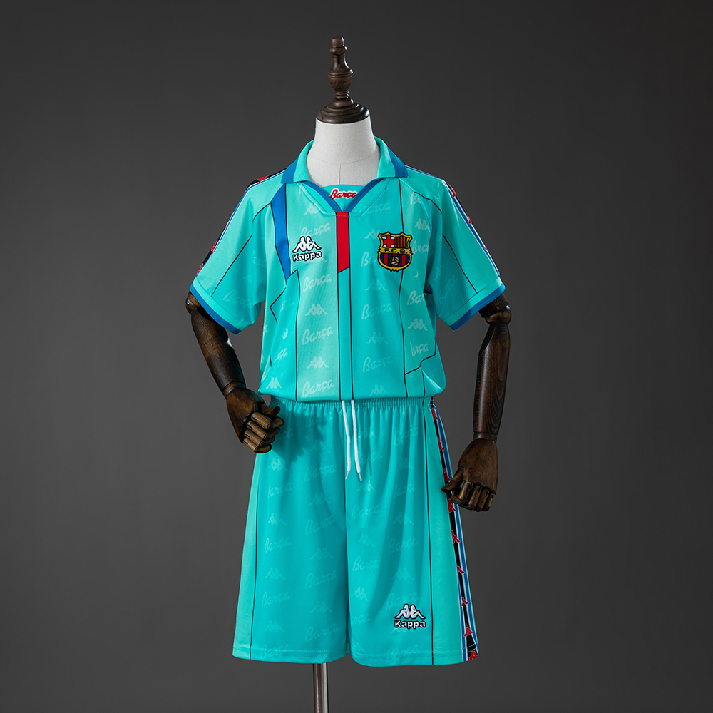Kids Barcelona Retro Away Kit 1996/97 Kids Barcelona Retro Away Kit 1996/97 front view in teal green with polo collar and matching shorts
