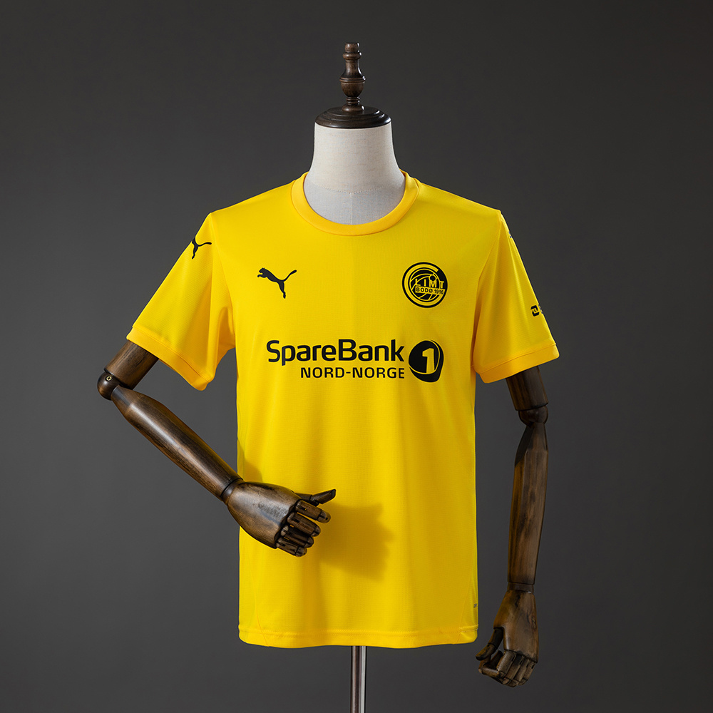 Mens FK Bodø/Glimt Home Jersey 2025/26 Mens FK Bodo/Glimt Home Jersey 2025/26 front view in electric yellow with black circular crest