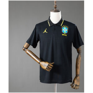 Front view of the Mens Brazil Black Polo 2026 with yellow collar tipping and embroidered CBF Brazil crest
