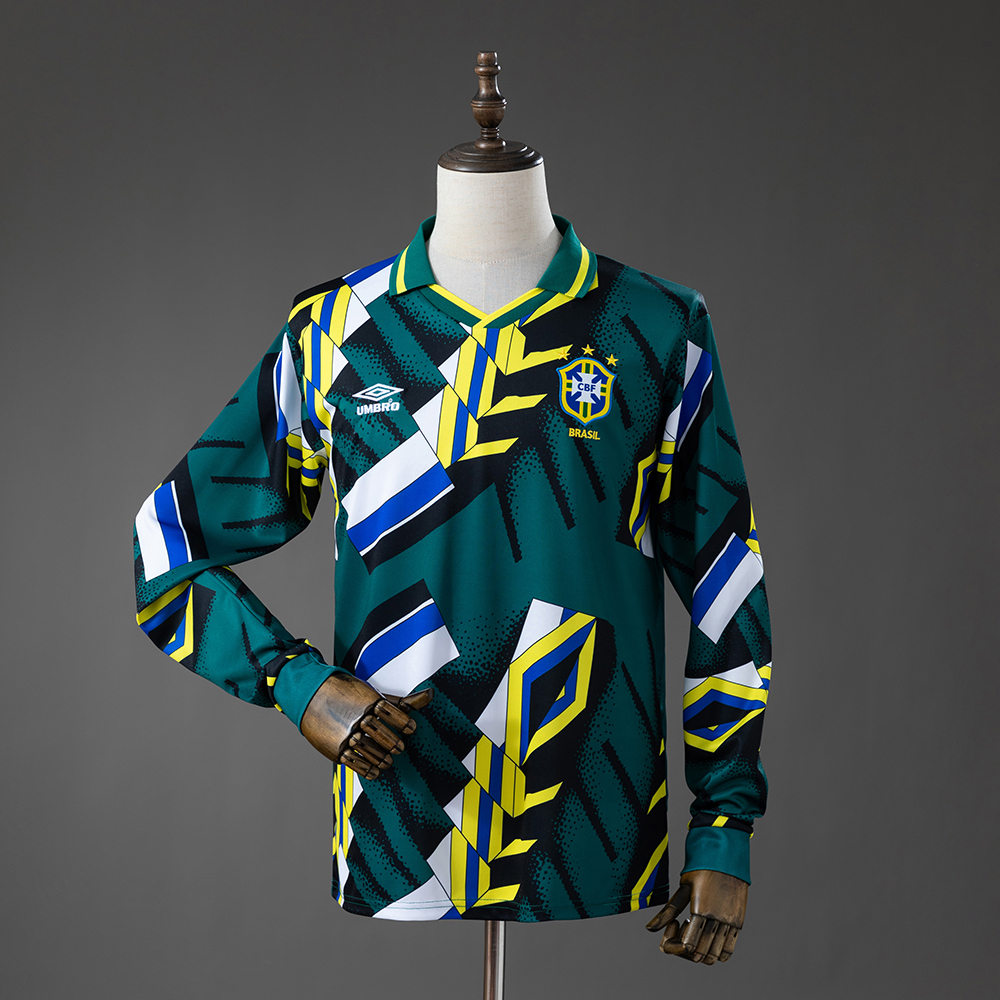 Mens Brazil Retro Long Sleeve Goalkeeper Jersey 1996/97 Front view of the Mens Brazil Retro Long Sleeve Goalkeeper Jersey 1996/97 showcasing vibrant geometric graphics, long sleeves, and the 4-star CBF crest.