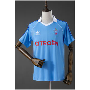 Front view of the Mens Celta de Vigo Retro Home Jersey 1984/85 in sky blue featuring white collar and red Citroen sponsor