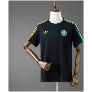 Front view of the Mens Celtic Travel Shirt Away Jersey 2026/27 in black with green and yellow shoulder stripes