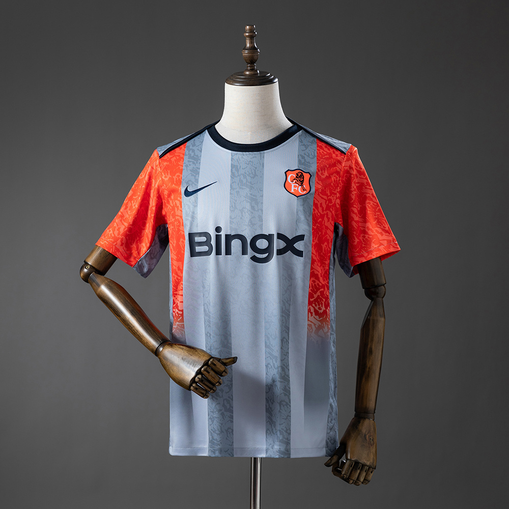 Mens Chelsea Pre-Match Jersey 2026/27 Front view of the Mens Chelsea Pre-Match Jersey 2026/27 in grey and fiery orange with BingX sponsor